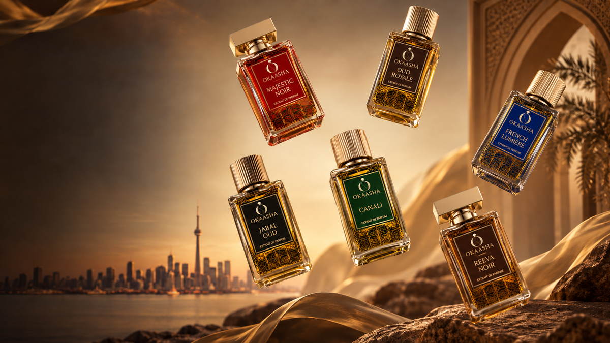 Six Okaasha fragrance bottles floating over a stylized Middle Eastern desert scene. The bottles have gold caps and labels in red, blue, green, and amber tones, with Original Okaasha branding visible on each bottle.